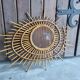 Asymmetrical rattan mirror