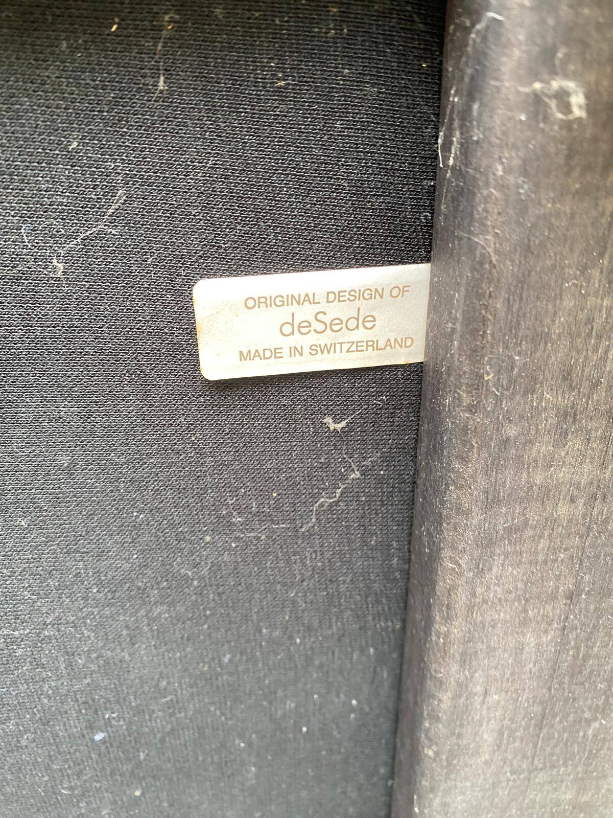 Scandinavian pouf design in brown leather, made in Switzerland by De Sede.