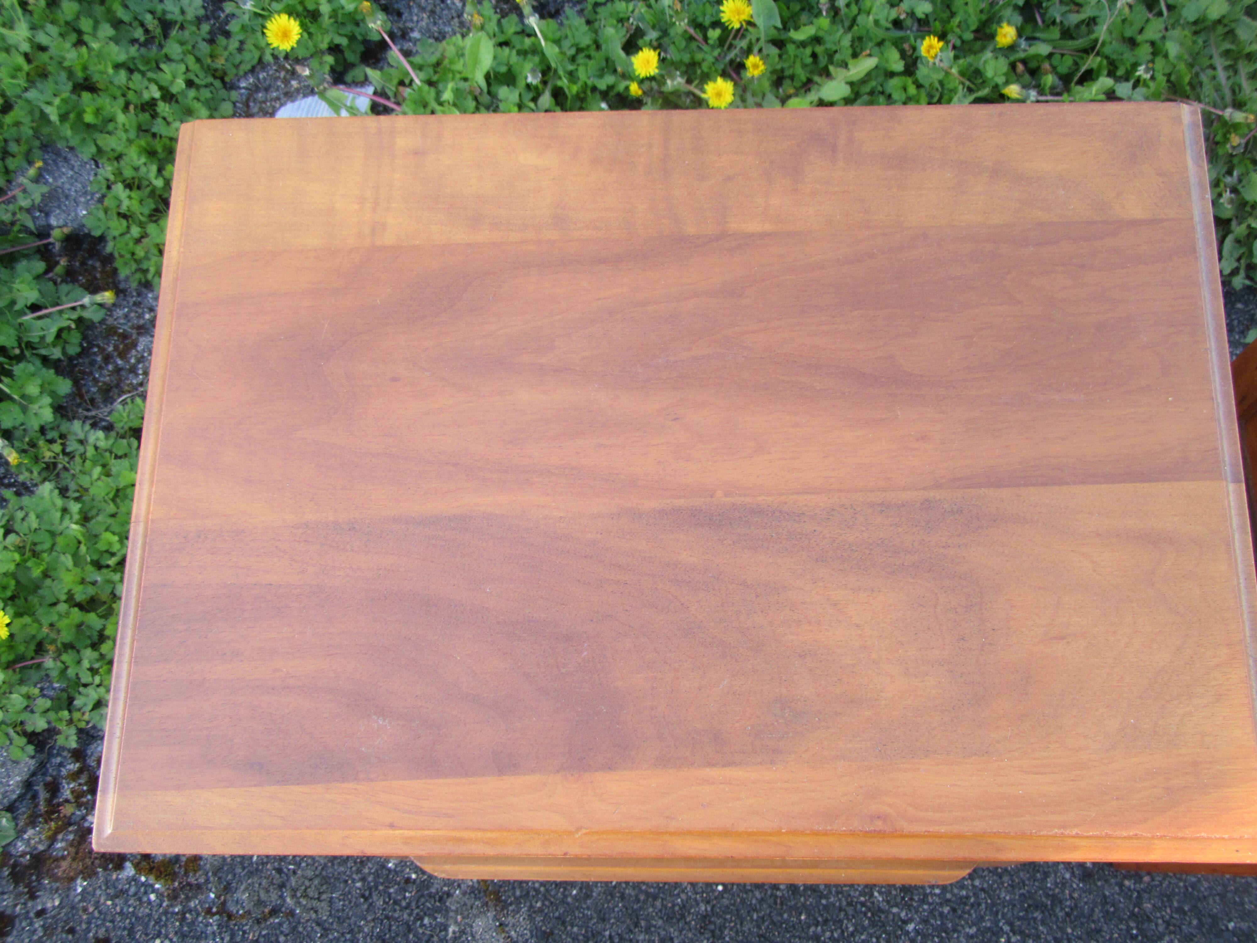 Pair of walnut bedside tables in Louis XVI style with brass inlay.