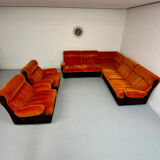 Modular vintage orange corner sofa, 1970s pop design.