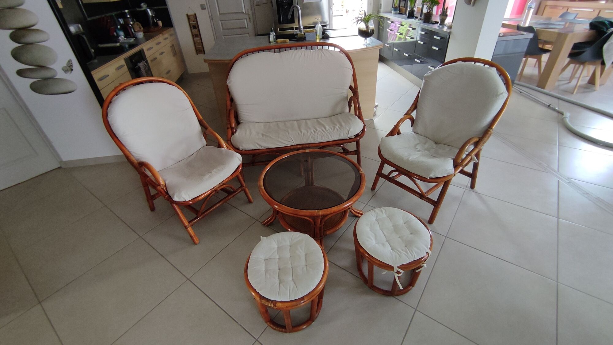 Sofa armchairs and coffee table in vintage rattan of six pieces