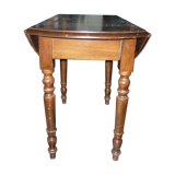 Table ronde a abatants en bois foncé