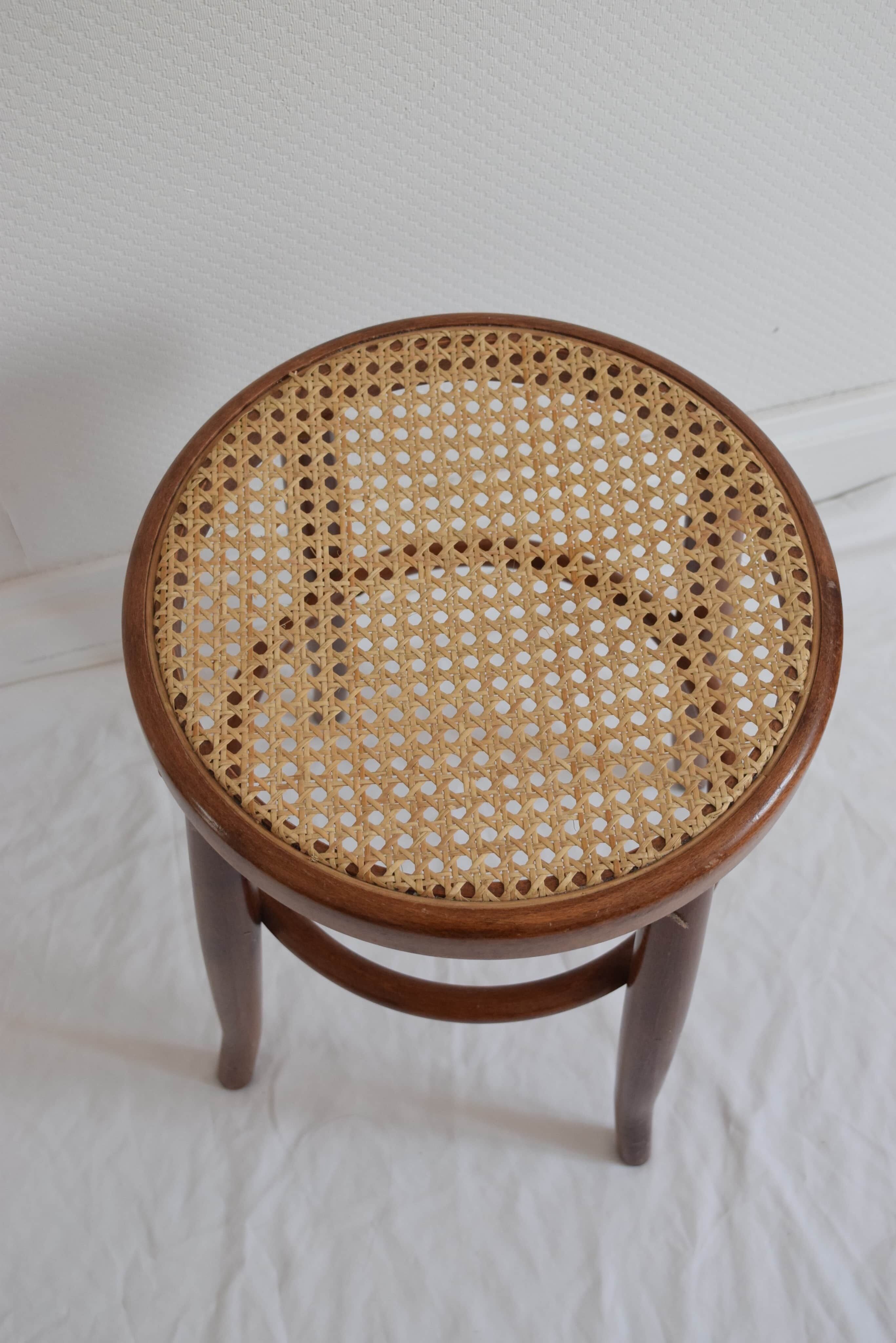 Curved wooden bistro and canne seating