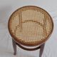 Curved wooden bistro and canne seating