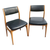 Pair of vintage Scandinavian chairs in teak and black faux leather.