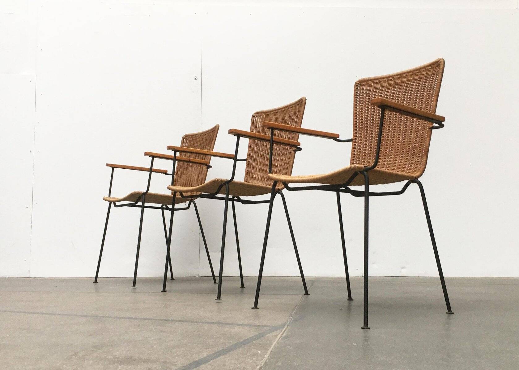 Mid-century metal and rattan dining chairs, set of 3.