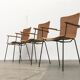 Mid-century metal and rattan dining chairs, set of 3.