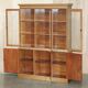 Library in the style of David Linley in satinwood, walnut, and rosewood.