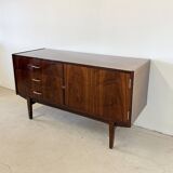 Subtle high-gloss sideboard in Scandinavian style