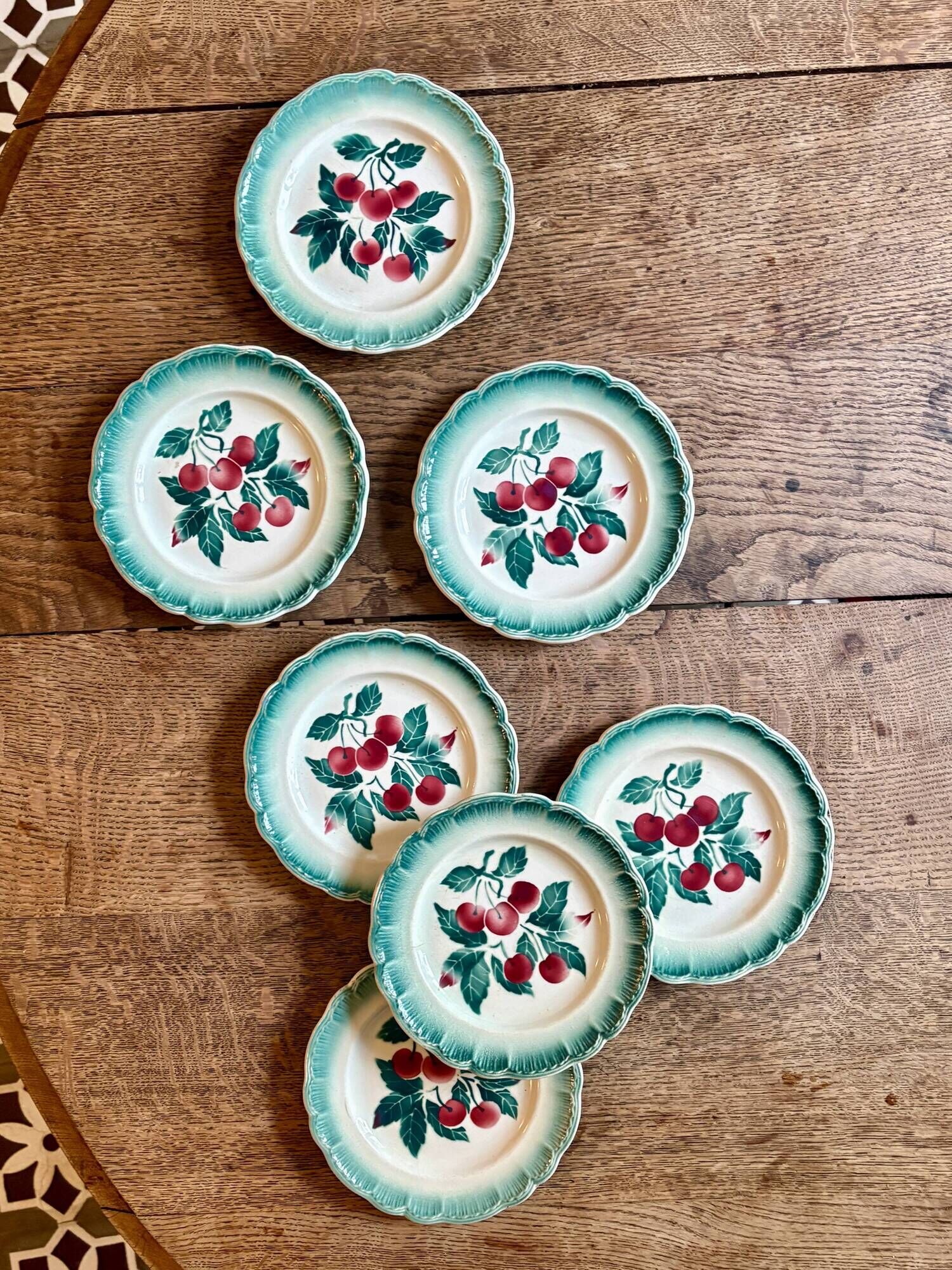 Set of 7 vintage Badonvilier dessert plates.