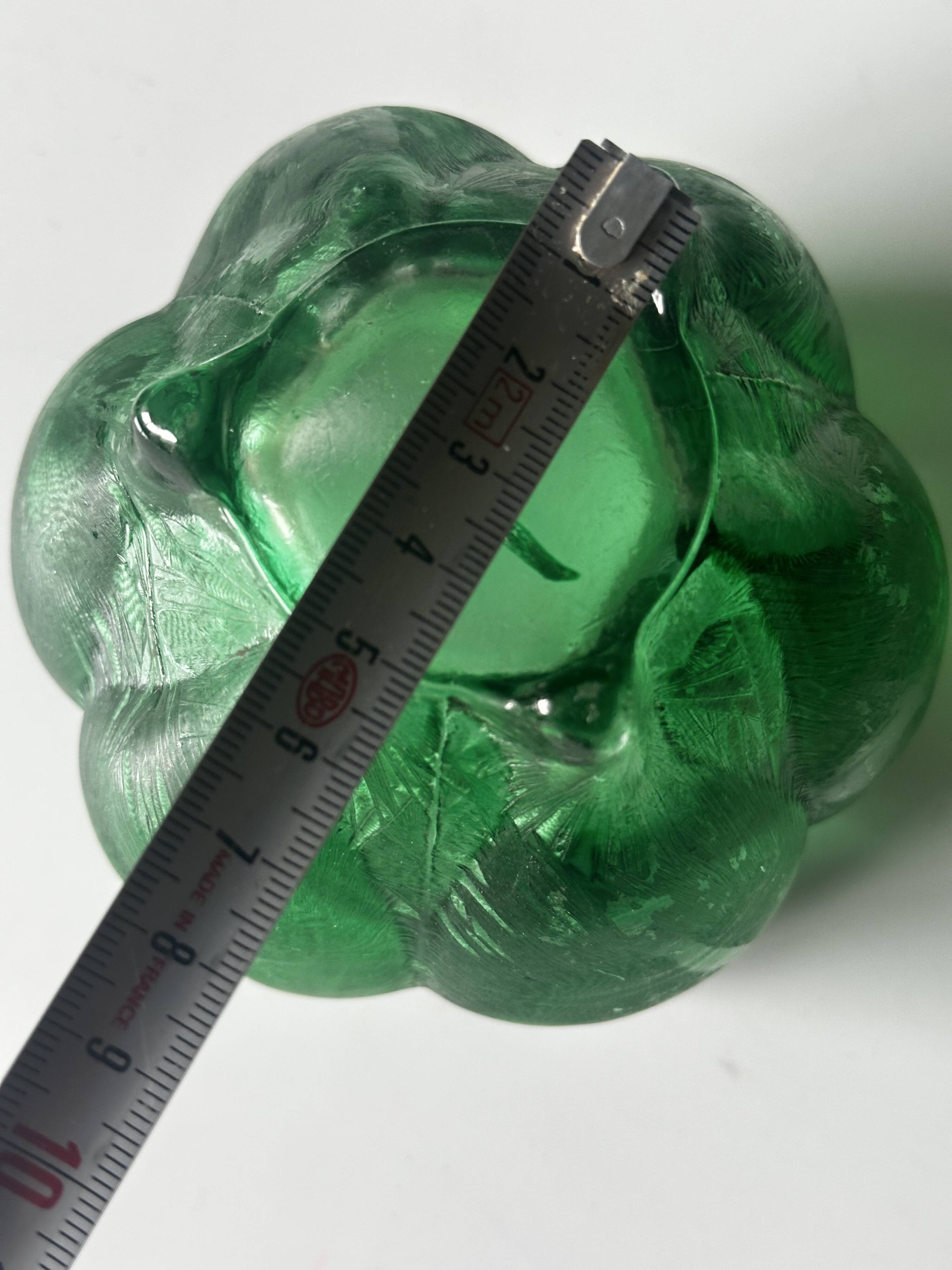 Green glass paste emptying cup from the Art Deco period