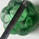 Green glass paste emptying cup from the Art Deco period
