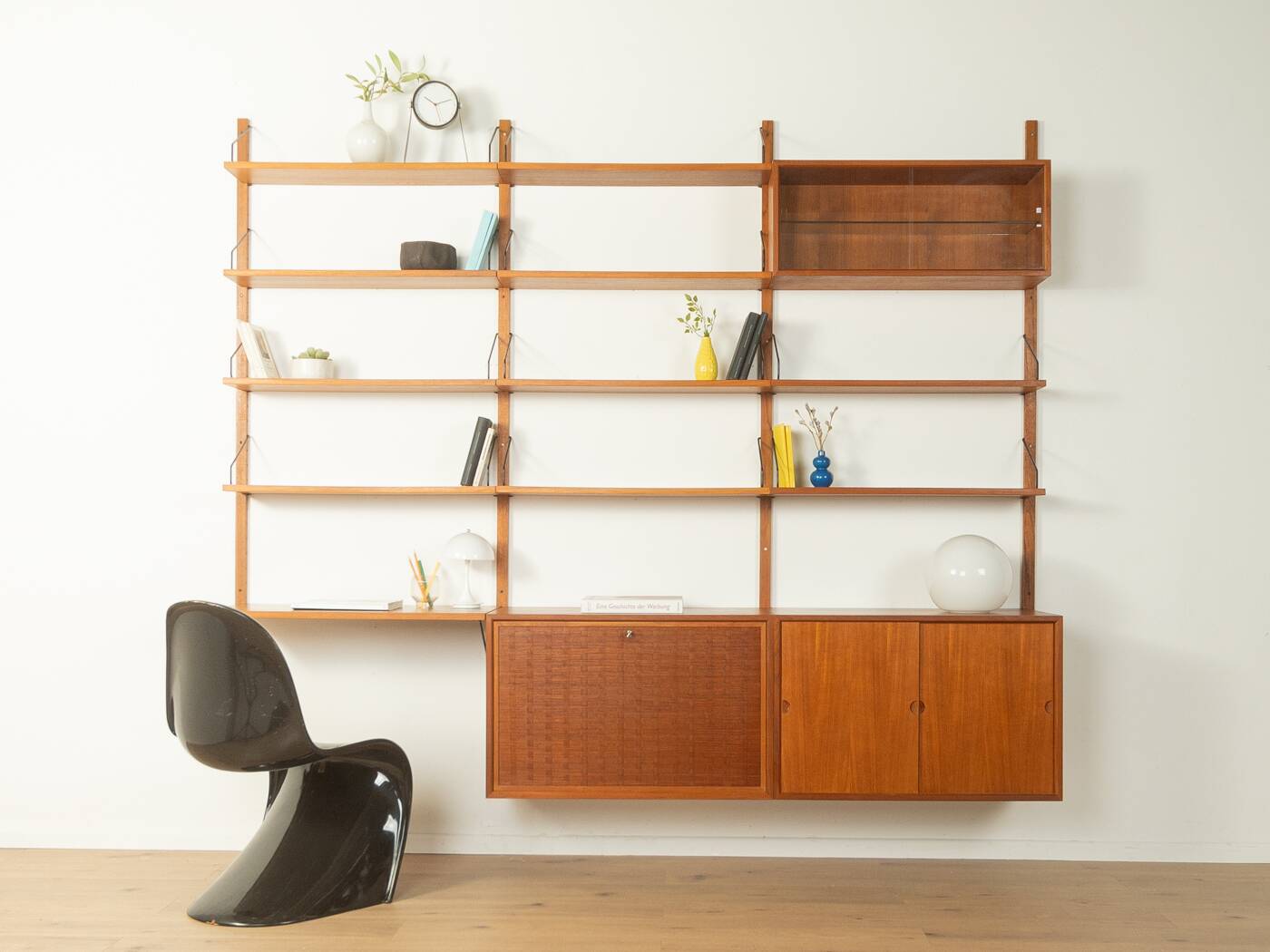 Classic shelving system from the 1950s in teak veneer by Poul Cadovius for Cado
