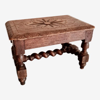 Small old carved wooden bench