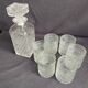 Chiseled glass whiskey service carafe and 6 Italian glasses