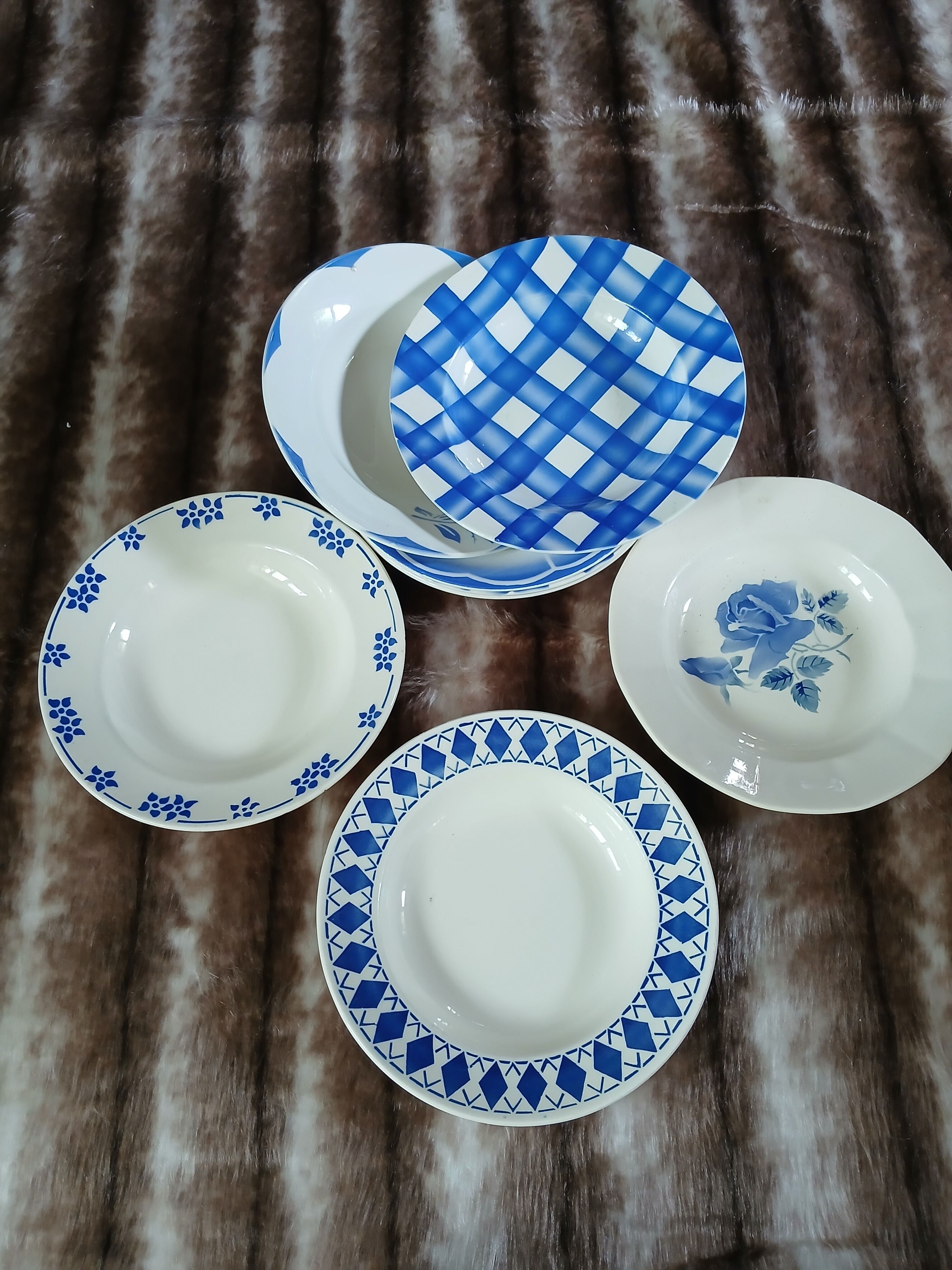 8 mismatched antique deep plates