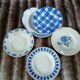 8 mismatched antique deep plates