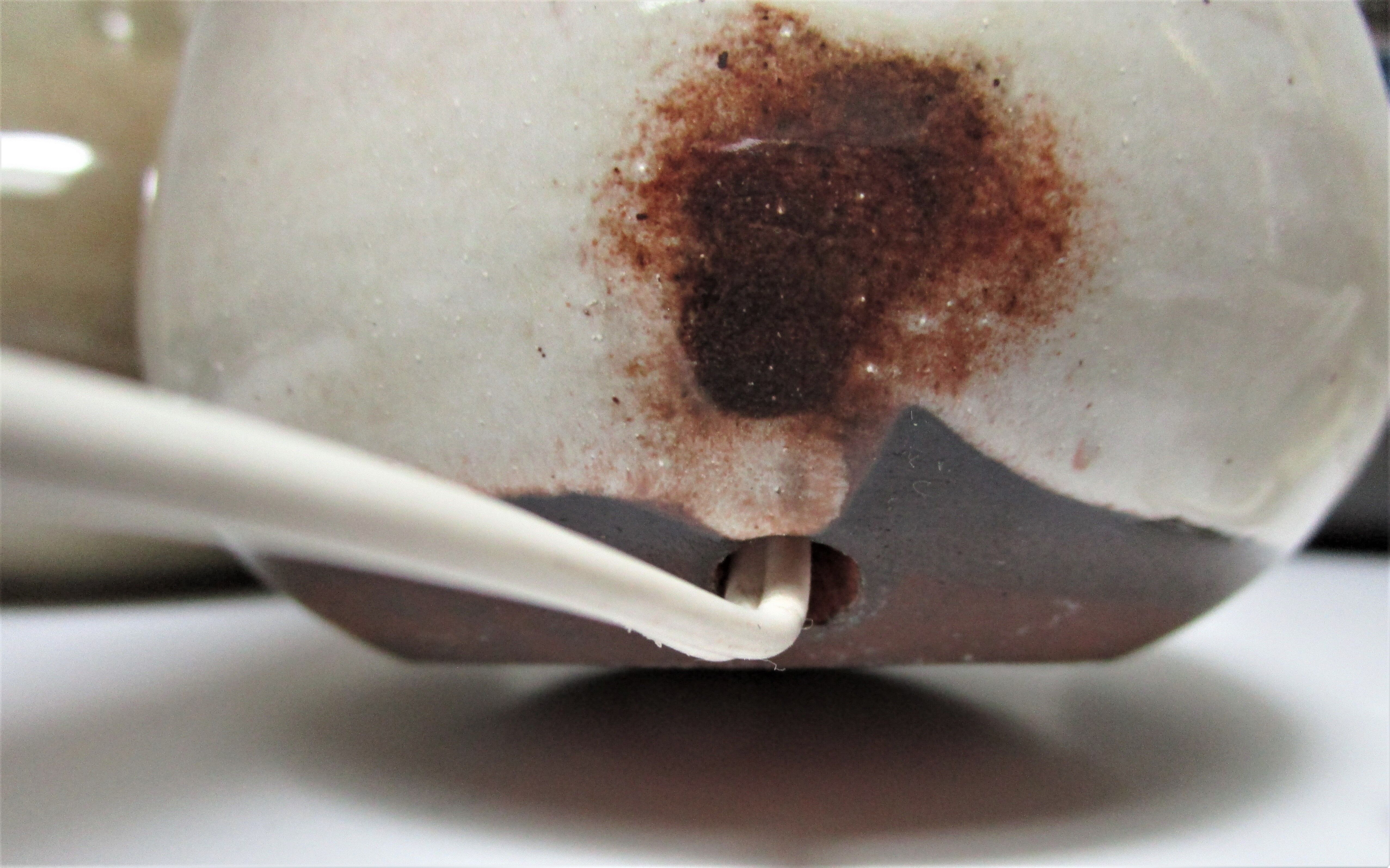 Three vintage ceramic lamps in blue, white and suede