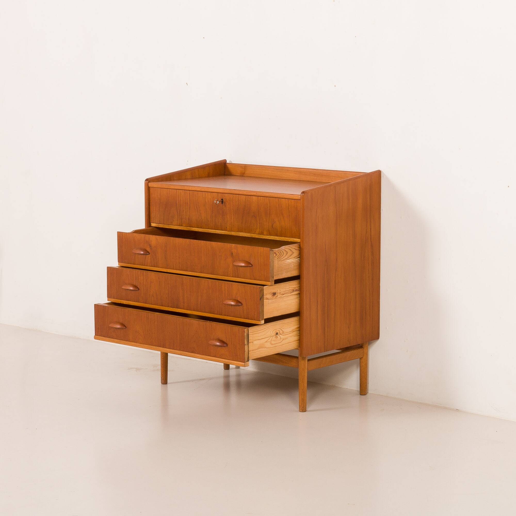 Danish teak dresser with hidden vanity and lights, 1960s