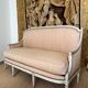 Louis XVI period sofa in lacquered wood