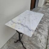 Antique cast iron and marble bistro restaurant table
