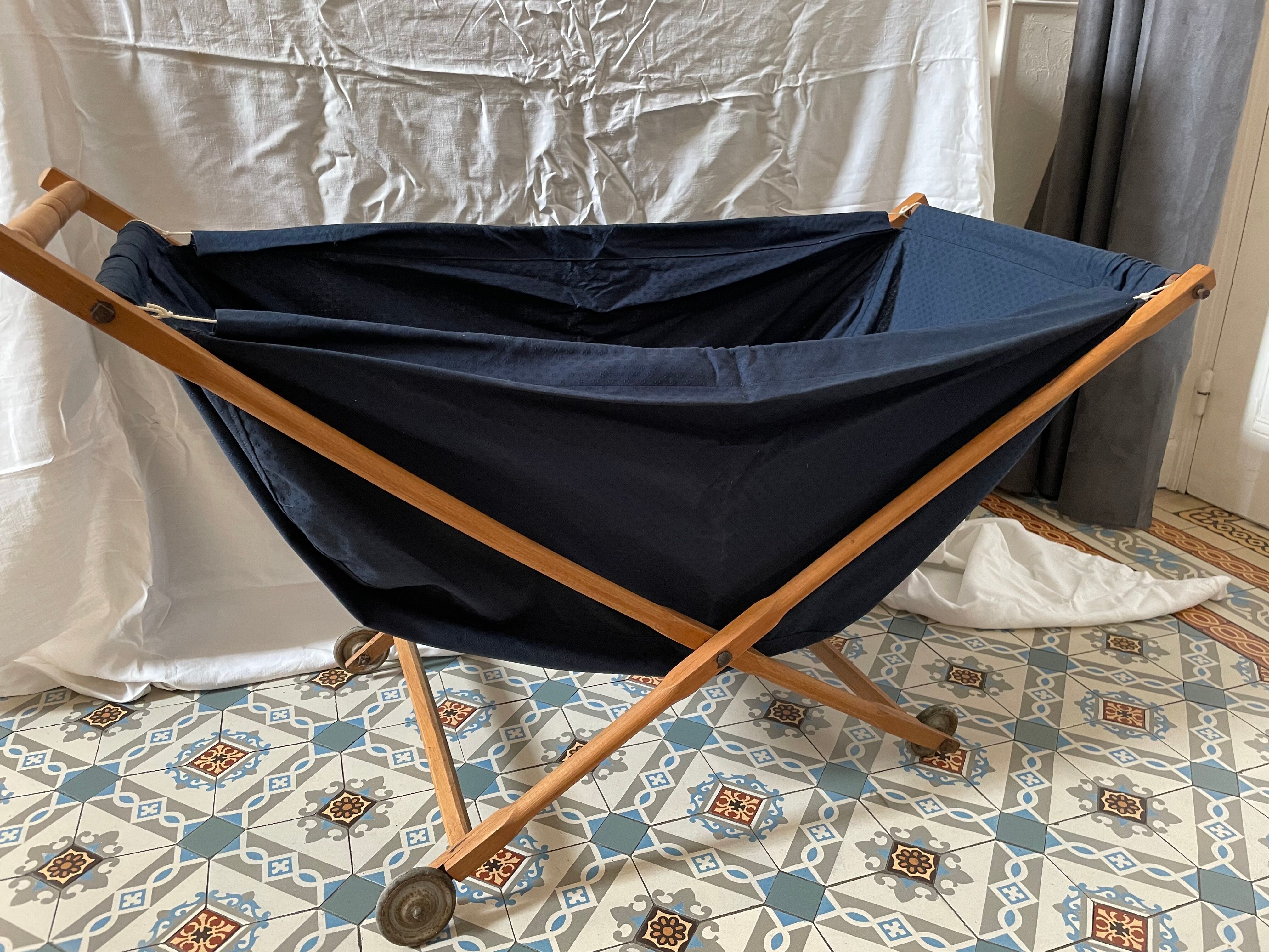 Ancient folding cradle