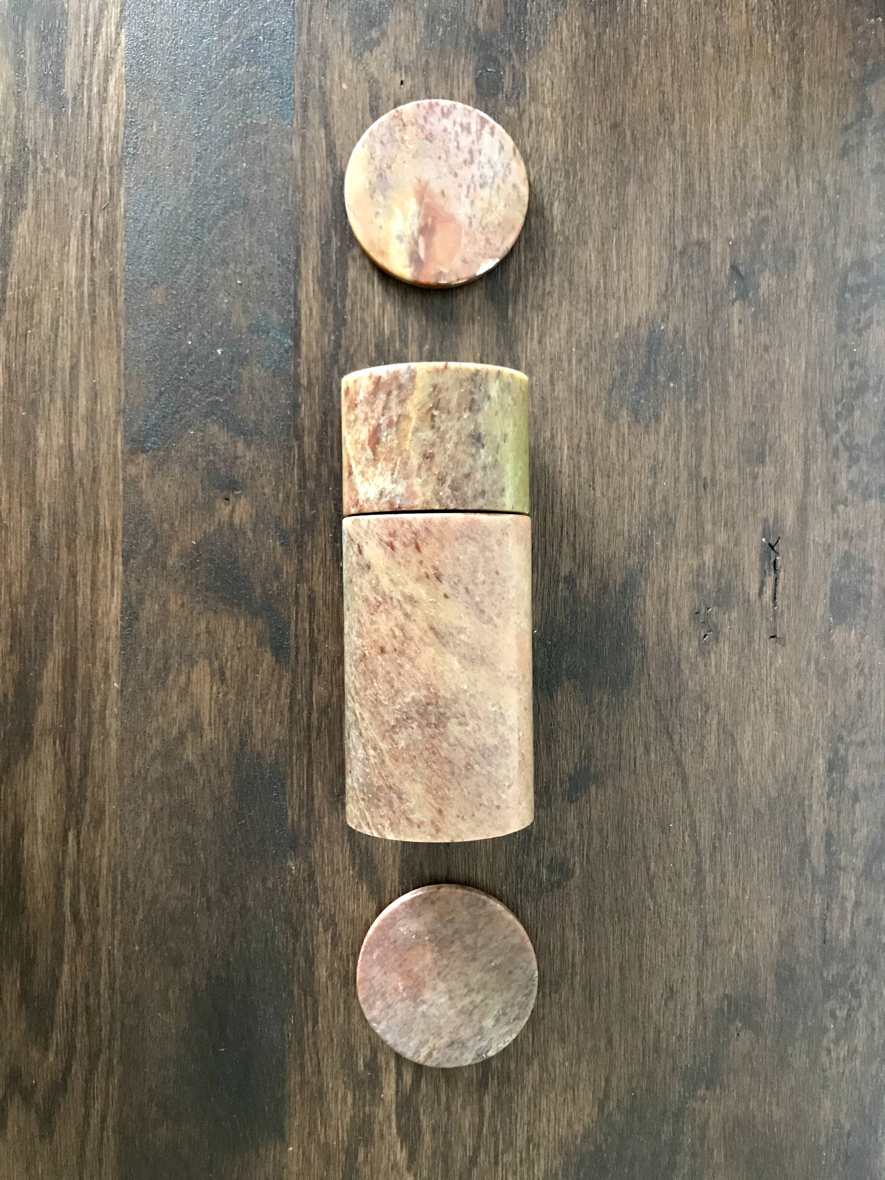 Duo of brown stone boxes