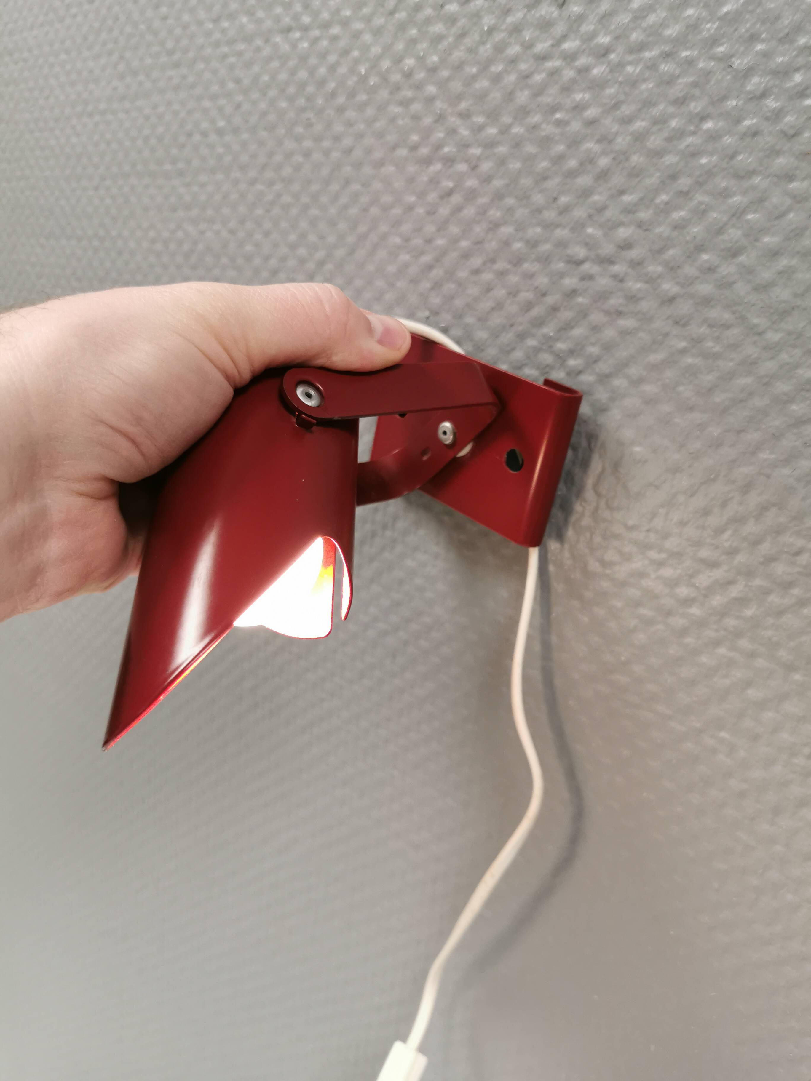 Small delicious wall lamp in Bordeaux red color from the 1980s