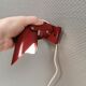 Small delicious wall lamp in Bordeaux red color from the 1980s