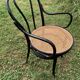 Fauteuil Thonet modèle 1018 en bois courbé noir et cannage 1930