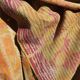 Fabric or plaid. old bed cover recycled and assembled worn deliberately