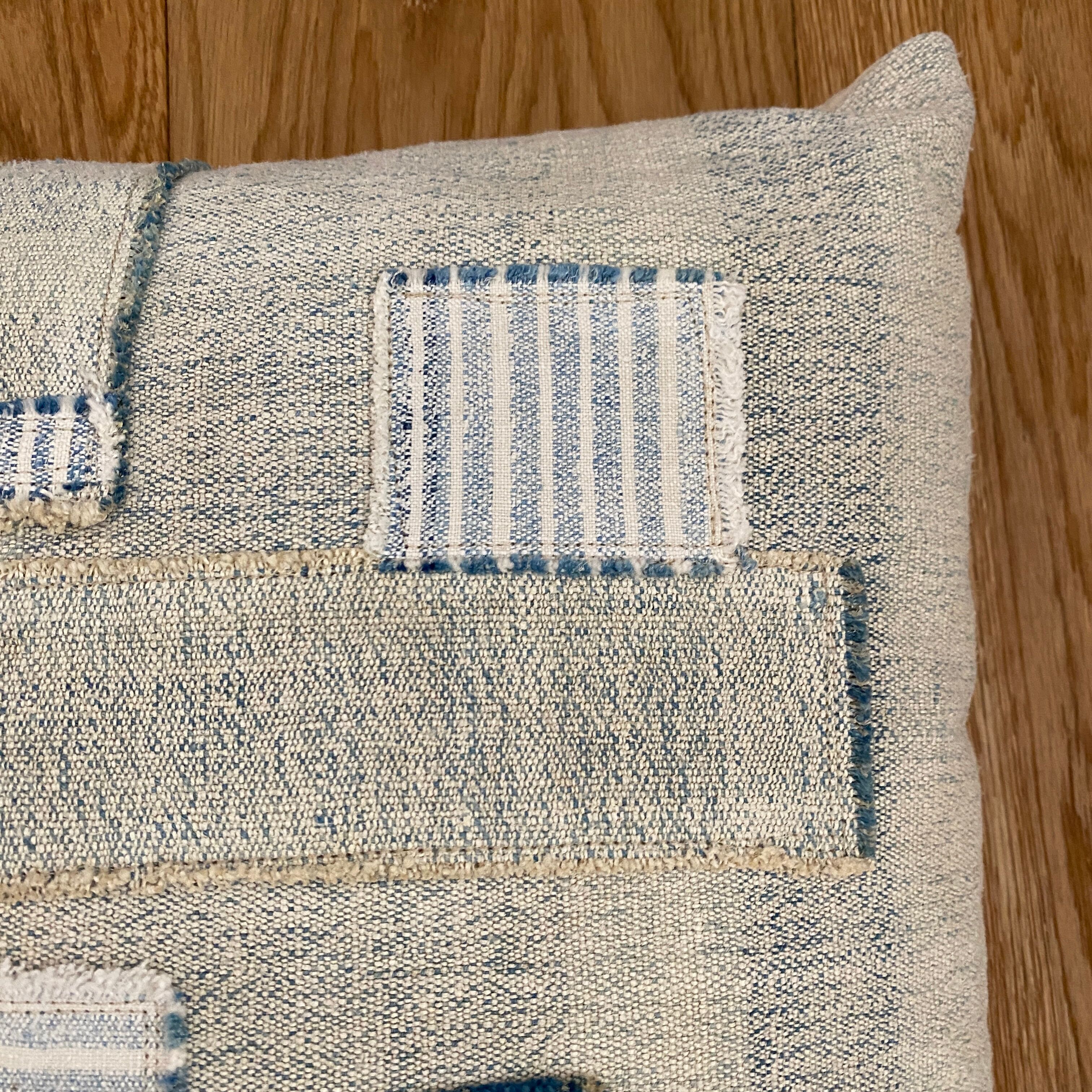 Old canvas cushion woven kilim style, patched
