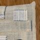 Old canvas cushion woven kilim style, patched