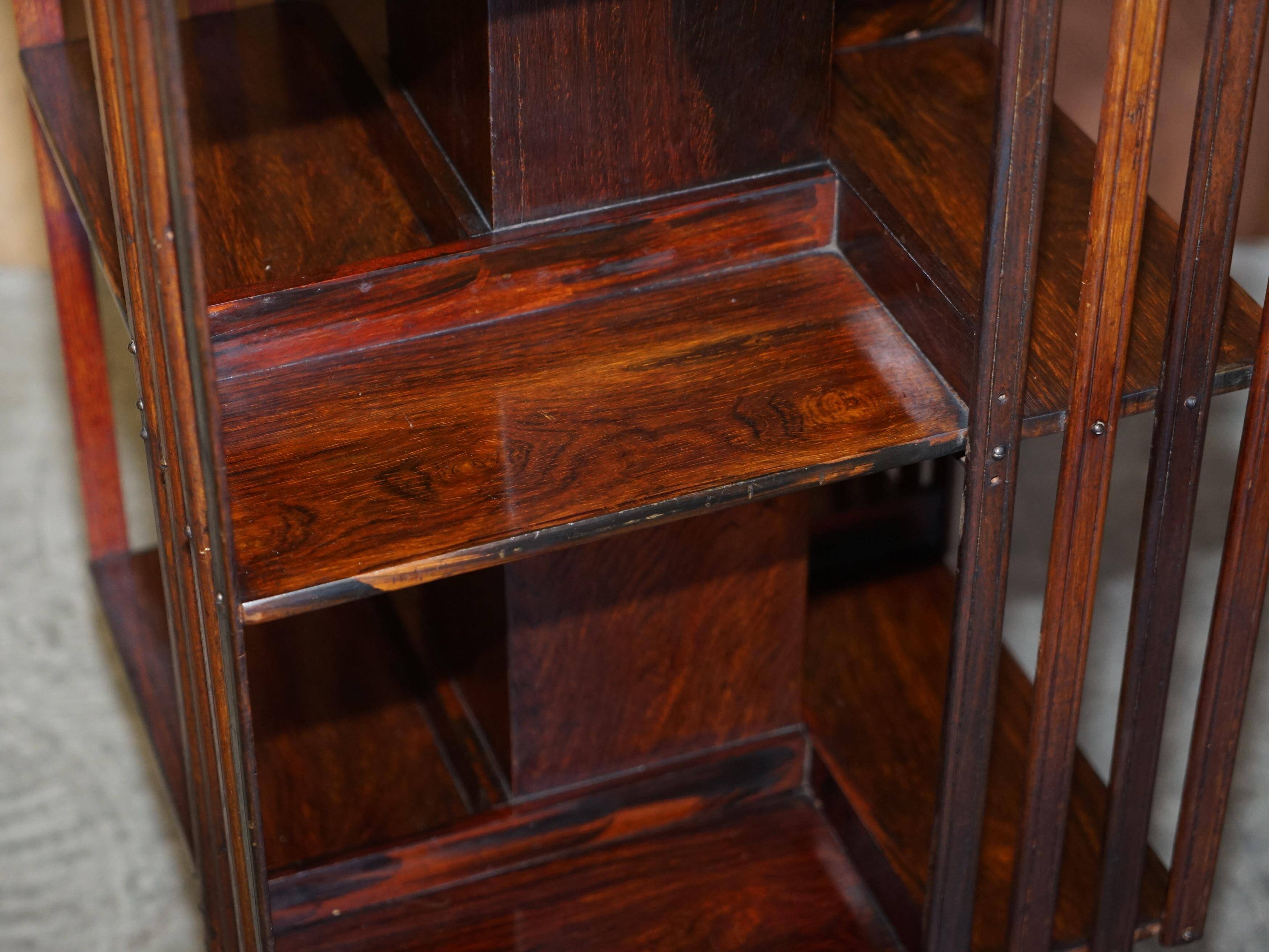 Edwardian revolving bookcase in hardwood with Sheraton inlay.