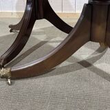 1950s English Regency walnut table with 1 extension leaf