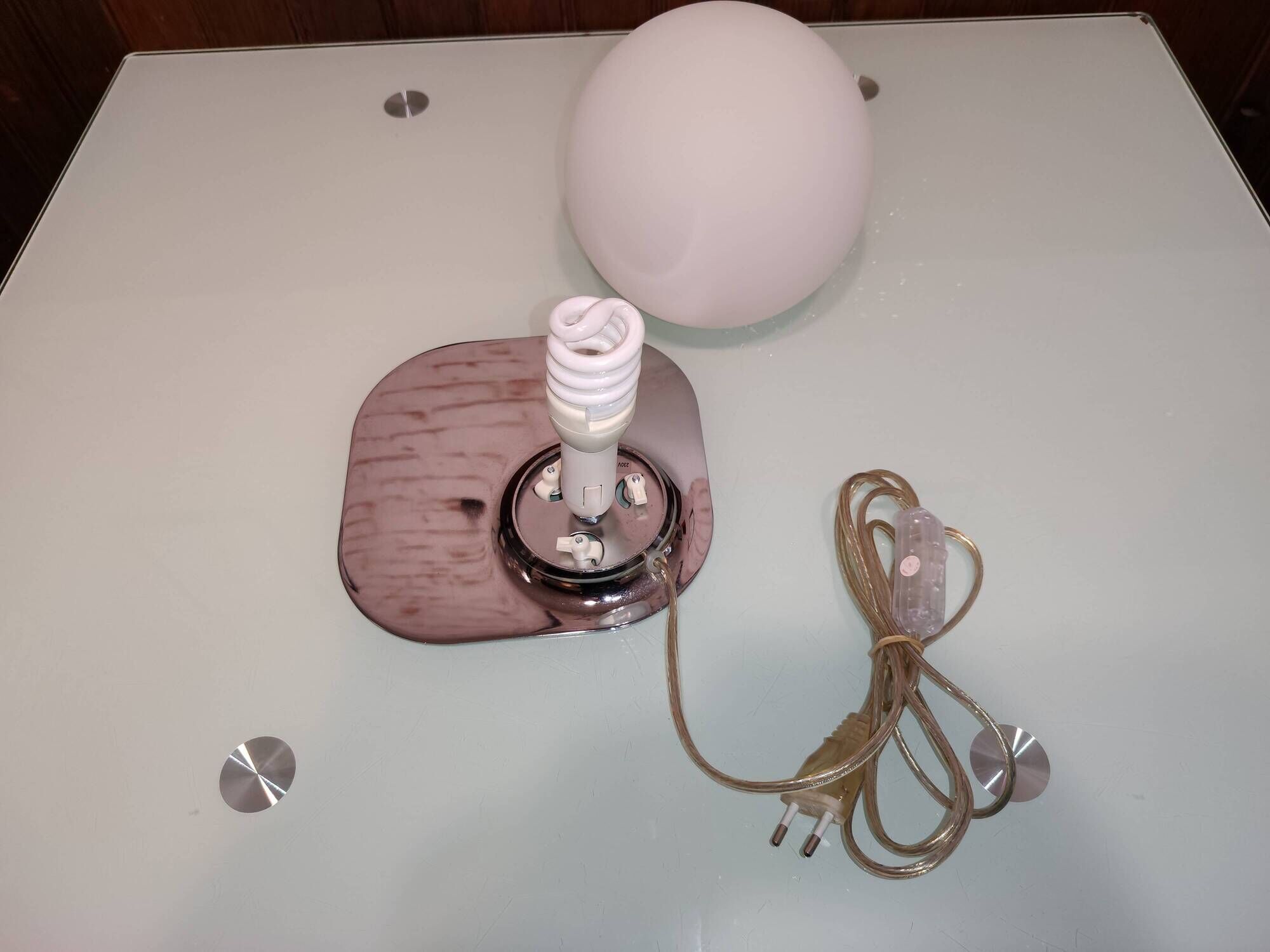 White globe lamp retro space age with chrome base. Philips