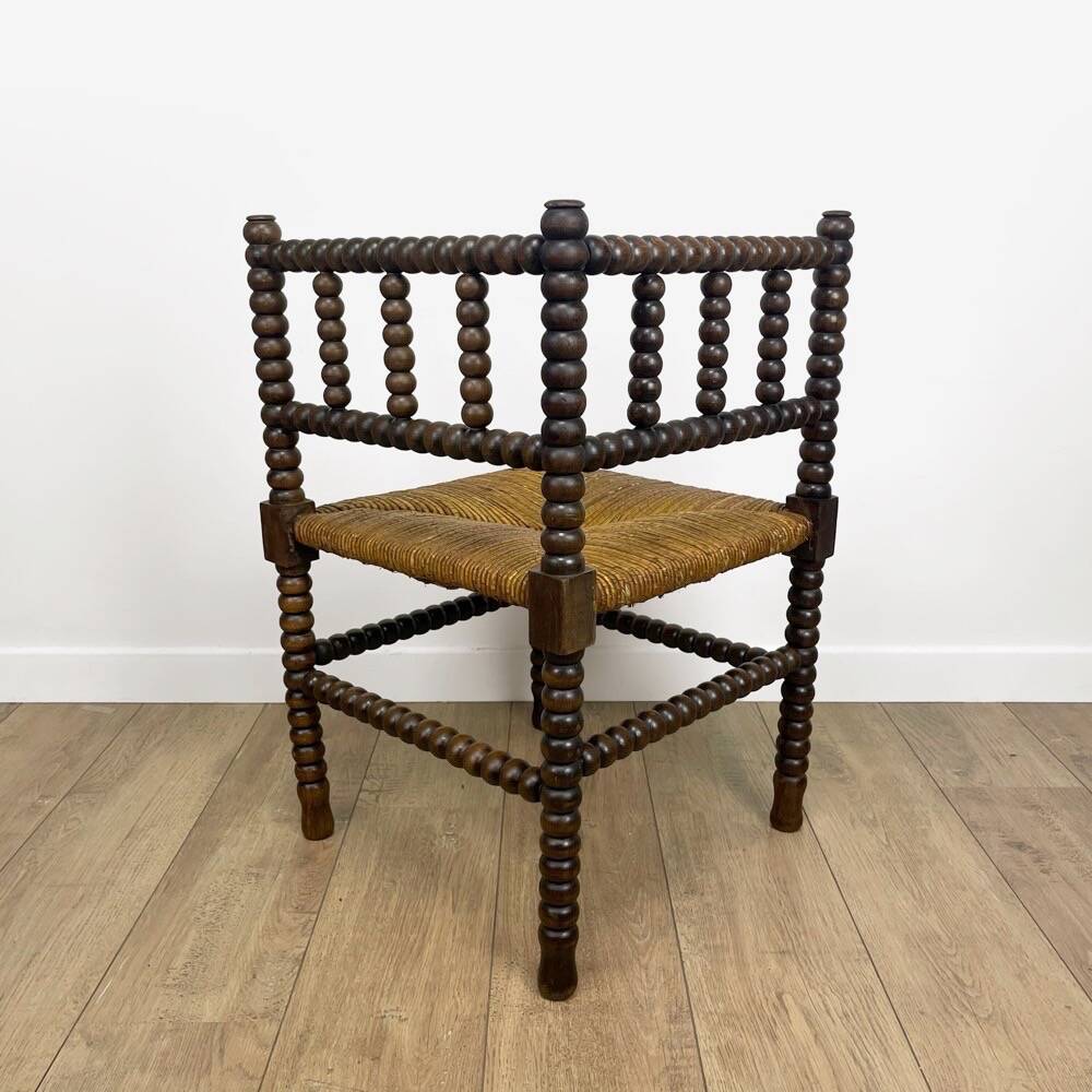 Old wooden ball fireside chair