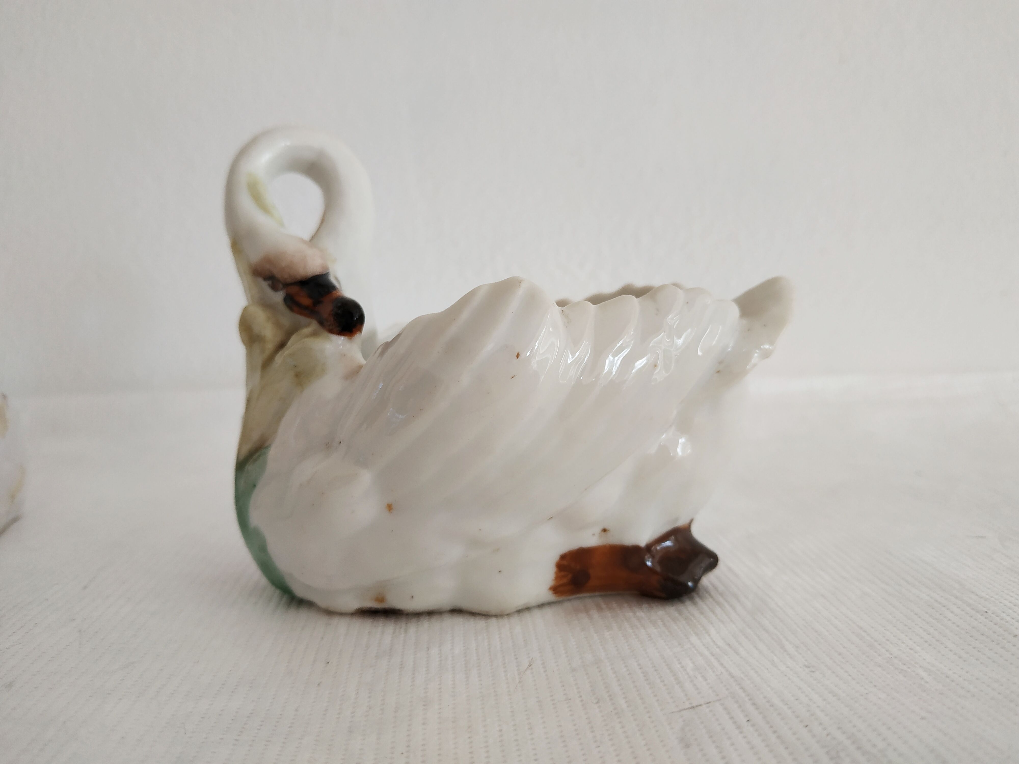 Mustard and salty swans, circa 1900