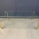 Peter Ghyczy style coffee table in brass and glass