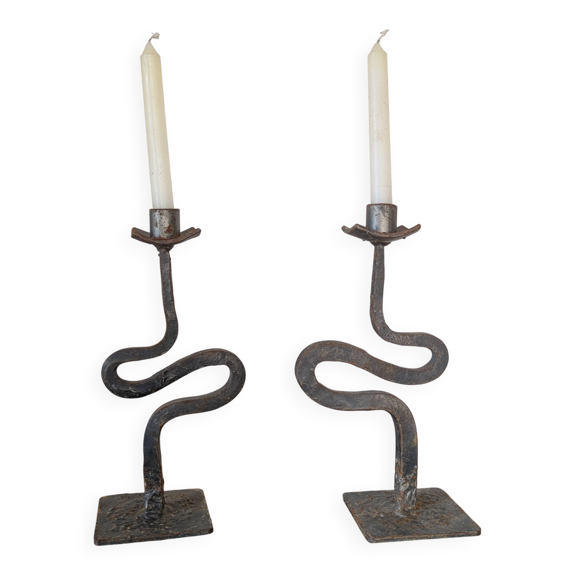Pair of wrought iron candlesticks
