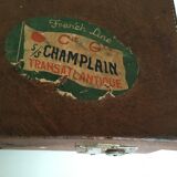 Suitcase of leather with labels of palaces