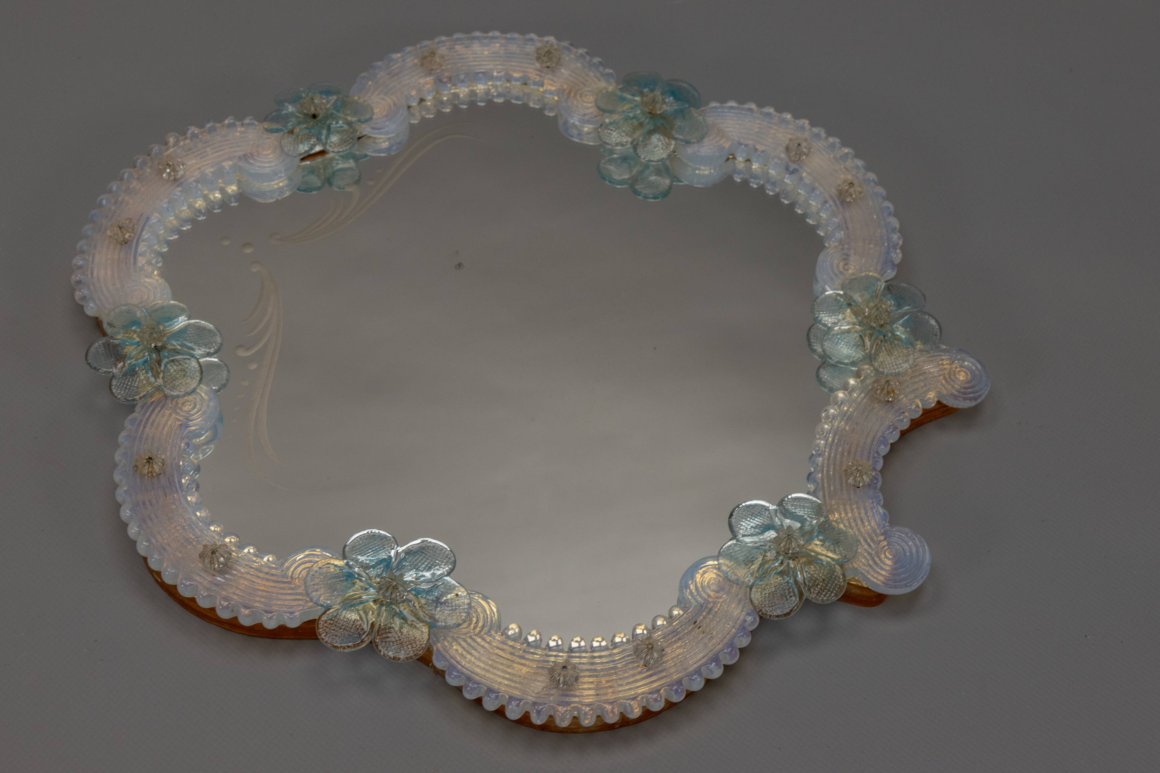 Italian Venetian Murano light blue and opalescent glass wall mirror, 1950s