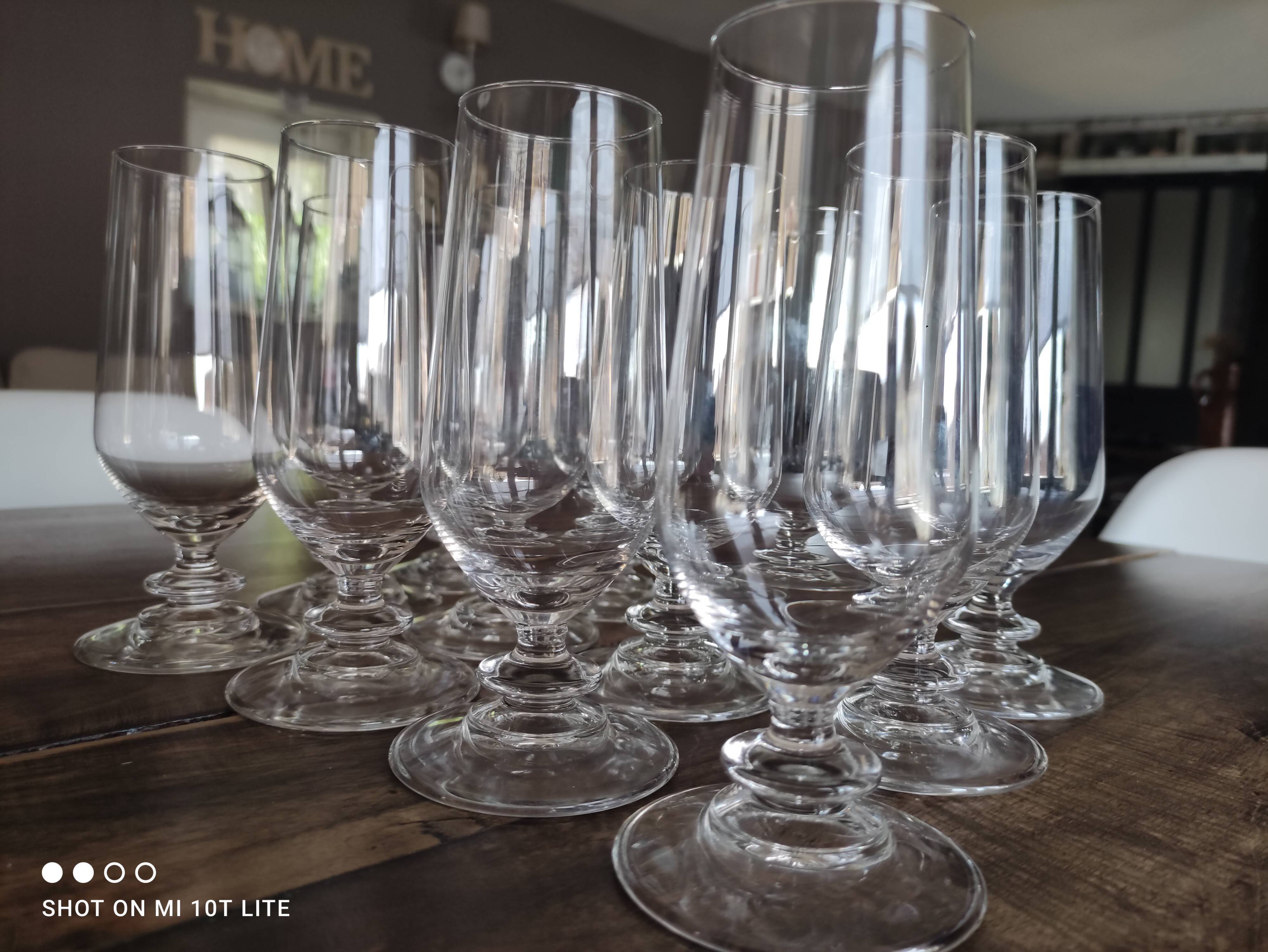 Set of 12 vintage champagne flutes on low crystalline stand