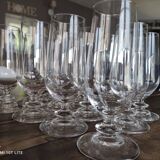 Set of 12 vintage champagne flutes on low crystalline stand