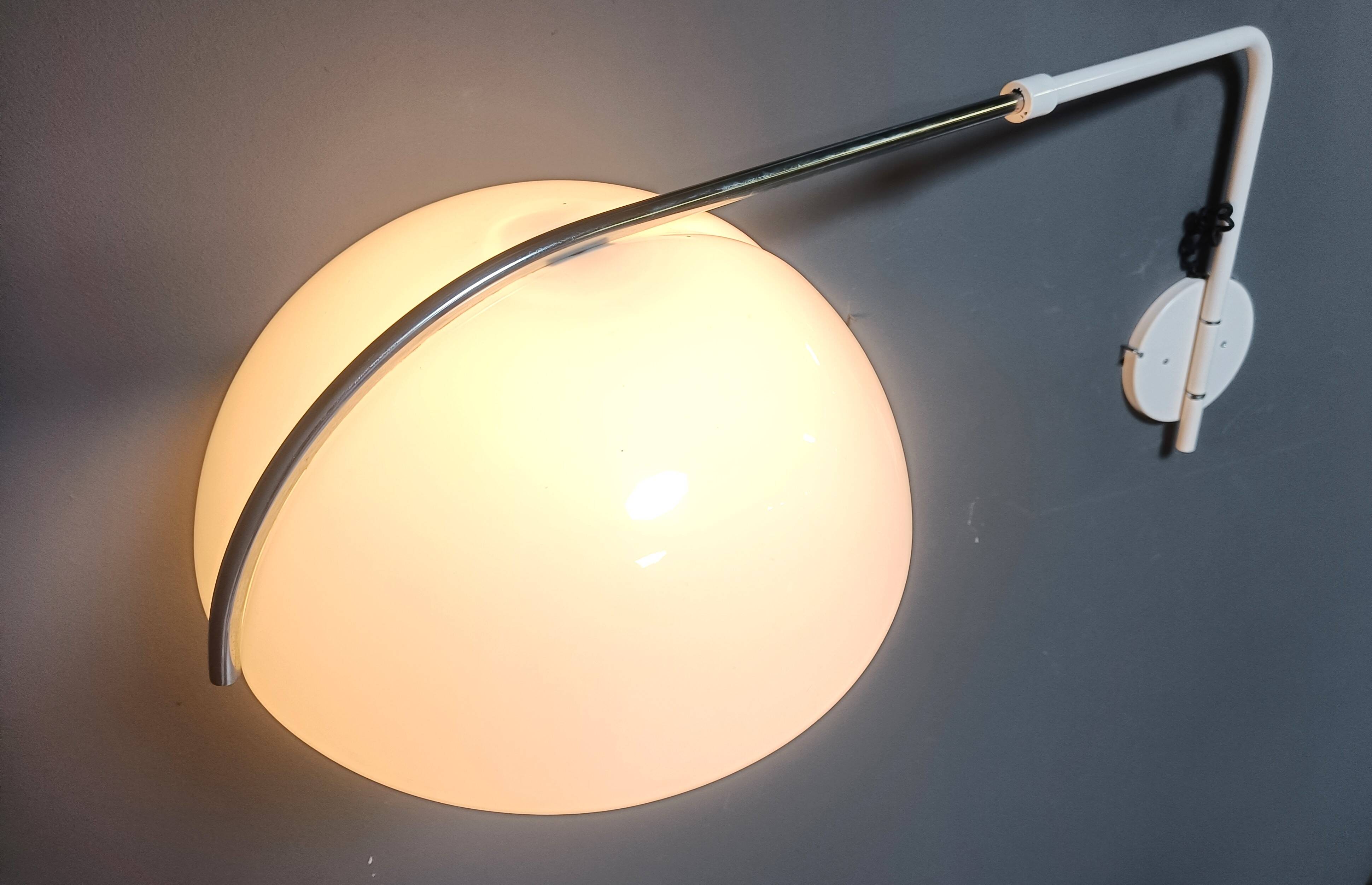 Vintage wall lamp by Luigi Massoni for Guzzini, 1970s