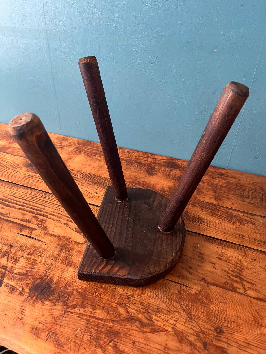 Wooden milking tripod stool