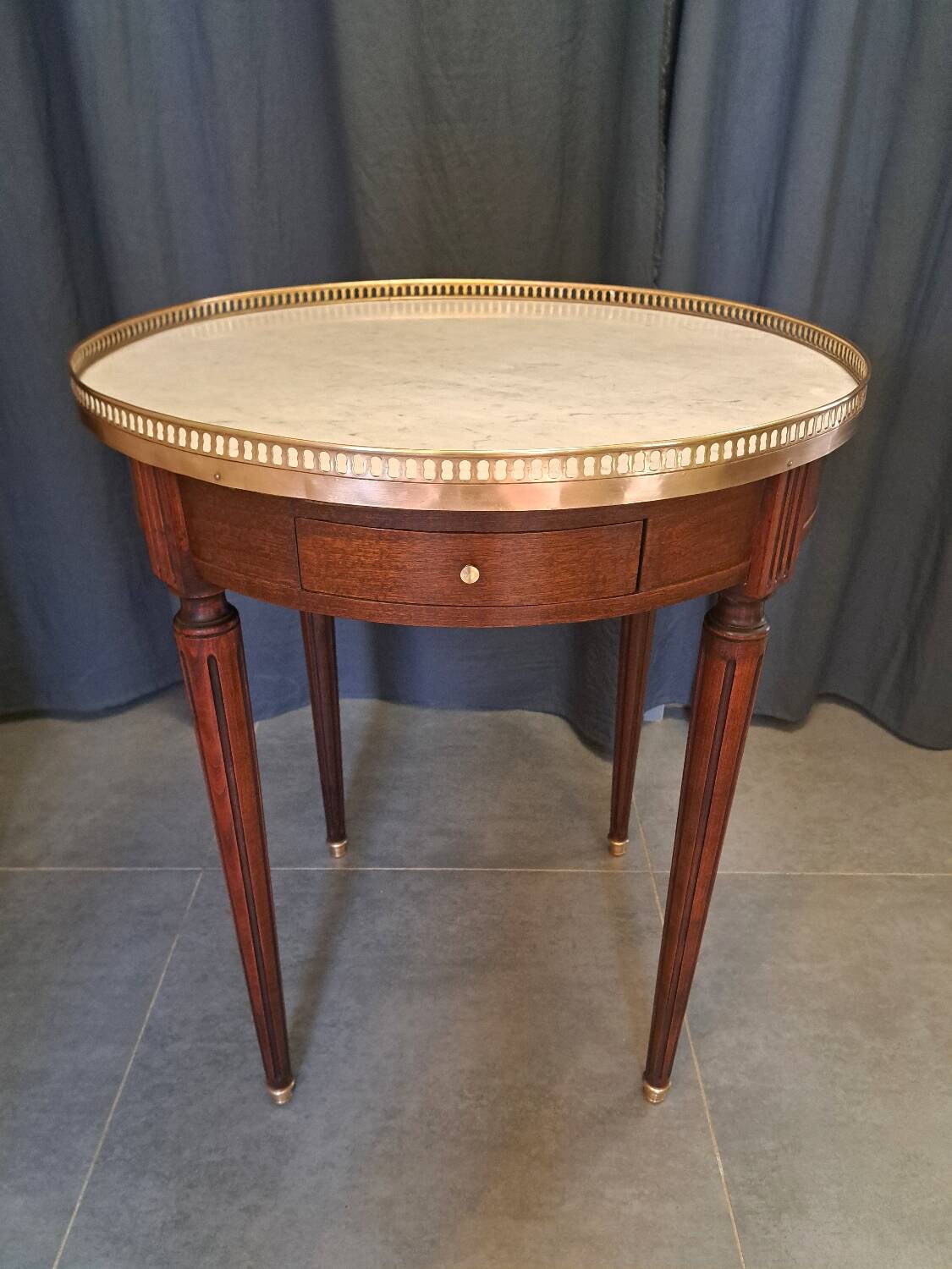 Mahogany and marble bouillotte table