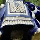 Elephant stool in glazed ceramic in cobalt blue and ivory colors