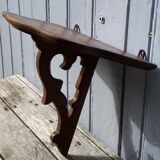 Carved wooden console shelf