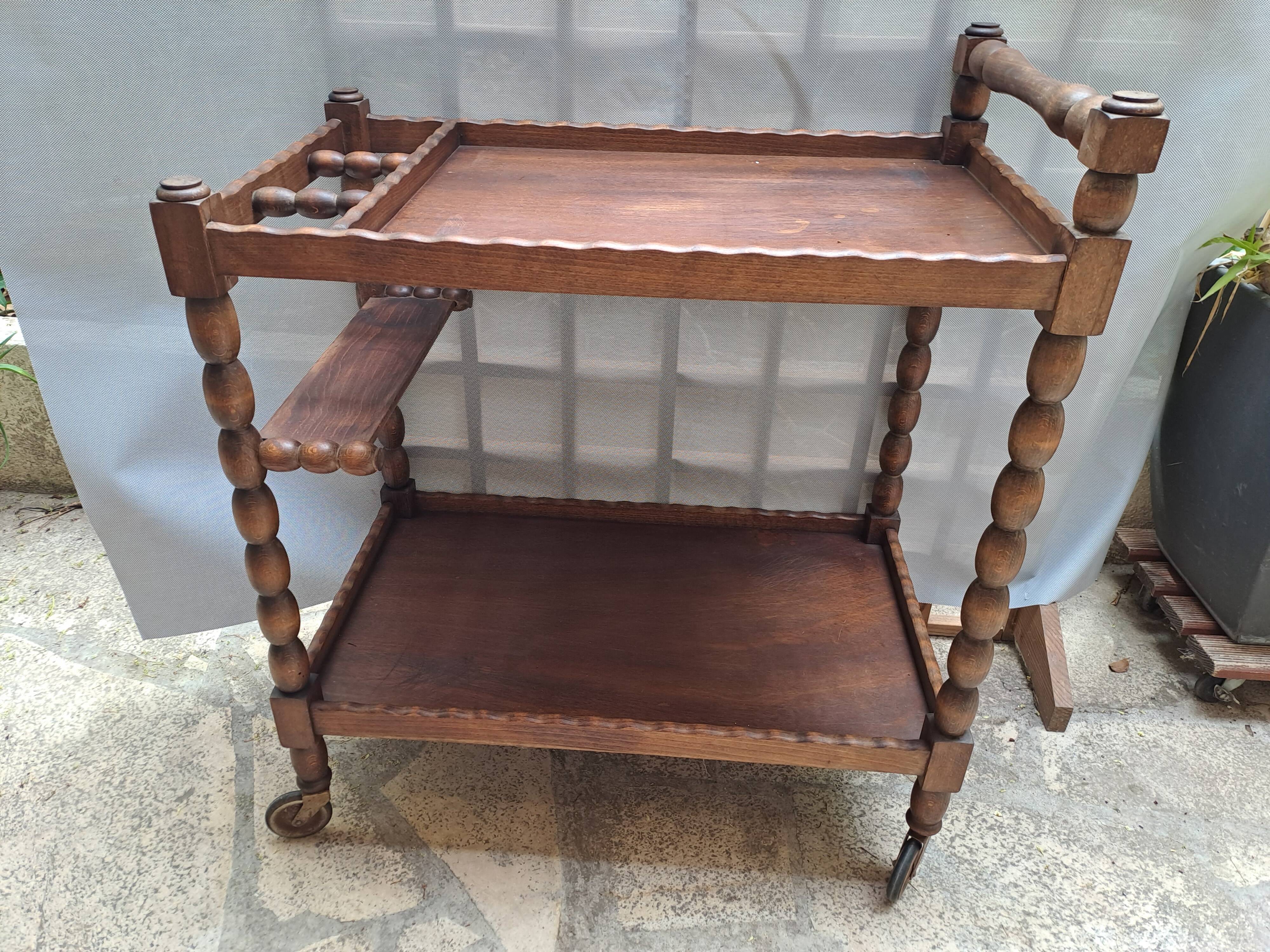 Dessert, table with wheels, side table in solid wood stained brown color France 1960